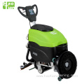 Cable powered hand floor scrubber